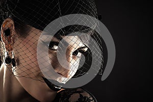 Portrait of retro woman in veil