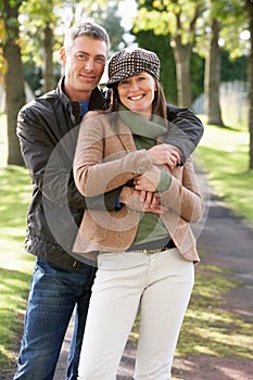 Portrait Of Romantic Couple Enjoying Outdoor Walk