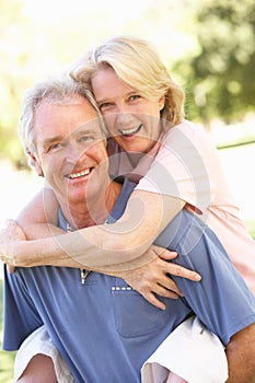 Portrait Of Romantic Senior Couple In Park