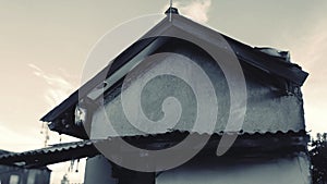 portrait of the roof of an old and fragil house