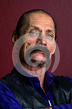 Portrait of a Rough and Distinguished Man with a Thick Mustache photo
