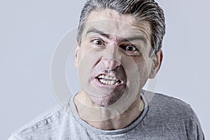 portrait of 40s to 50s white angry and upset guy and crazy furious and aggressive face expression nagging and complaining