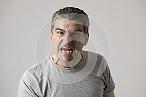 Portrait of 40s to 50s white angry and upset guy and crazy furious and aggressive face expression nagging and complaining