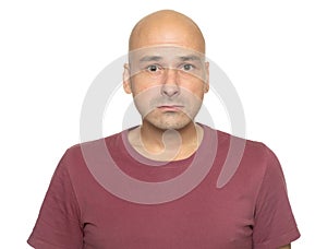 Portrait of a sad bald man isolated