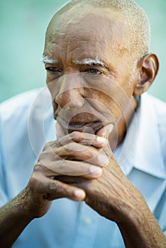 Portrait of sad bald senior man