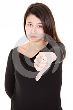 Portrait of sad crying pensive mad crazy young woman thumbs down isolated on white background