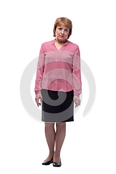 Portrait of sad and depressed looking mature woman in pink blouse