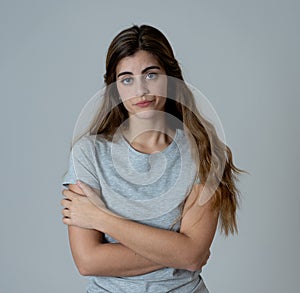 Portrait of sad and depressed woman. Isolated in white background. Human expressions and emotions