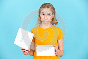 Portrait of sad disappointed woman with opened gift box
