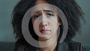 Portrait sad female african ethnic american girl student serious anxious looking at camera frustrated worried about