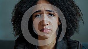 Portrait sad female african ethnic american girl student serious anxious looking at camera frustrated worried about