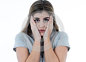 Portrait of sad and intimidated woman. Isolated in white background. Human expressions and emotions