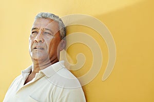 Portrait of sad mature hispanic man