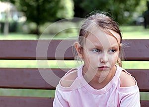 portrait of a sad pensive little girl