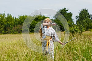 Portrait of Samurai Girl with a sword