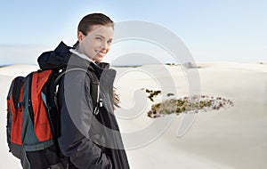 Portrait, sand dunes or happy woman in nature to hike for adventure, desert landscape and travel for holiday. Scenery