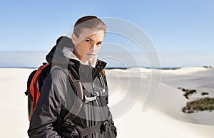 Portrait, sand dunes or woman in nature to hike for adventure, desert landscape and travel for holiday. Mockup, hiker or