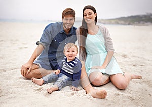 Portrait, sand and family with smile in beach, mother and father together with cute baby boy for love. Holiday, mom and