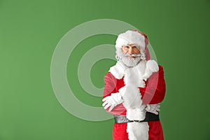 Portrait of Santa Claus on color background