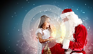 Portrait of santa claus with a girl
