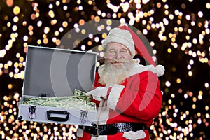 Portrait of Santa Claus with a lot of dollars.