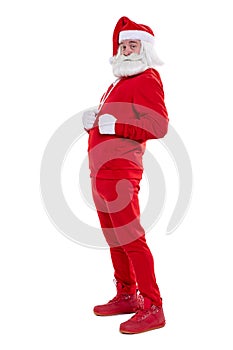 Portrait of a Santa Claus in red sportsware in full growth