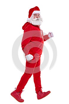 Portrait of a Santa Claus in red sportsware in full growth