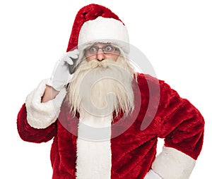 Portrait of santa claus talking on the phone