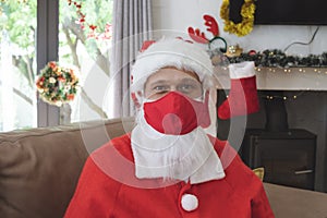 Portrait of Santa Claus wearing face mask