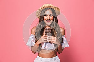 Portrait of a satisfied young girl in summer clothes