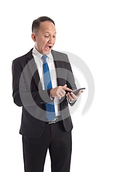 Portrait of a scared man looking at his mobile phone