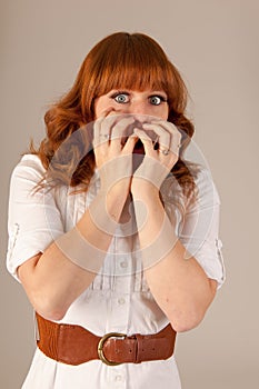 Portrait scaring woman