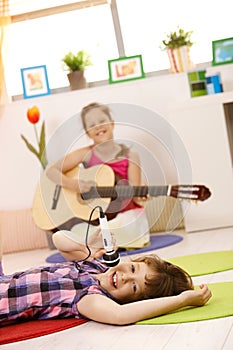 Portrait of schoolgirls playing music