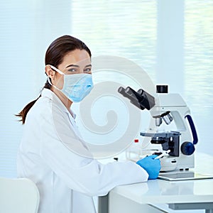 Portrait, science and woman in lab, microscope and research for breakthrough, dna and medical. Face mask, person or