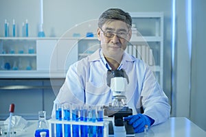 Portrait of scientist during experiment in laboratory, Science and technology healthcare concept