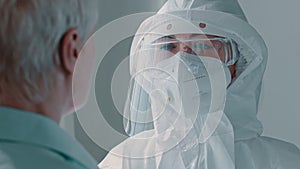 Portrait scientist in laboratory doctor nurse woman wearing medical protective uniform clothing using equipment for