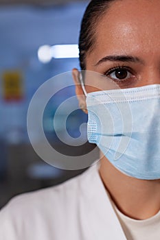 Portrait of scientist researcher eye looking into camera photo