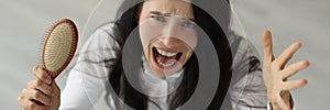 Portrait of screaming woman with severe hair loss closeup
