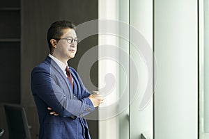 Portrait of a senior asian business manager