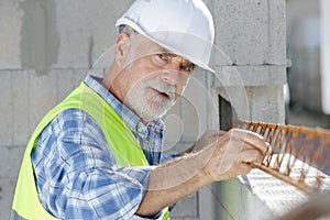 portrait senior builder