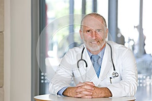 Portrait of a senior caring doctor