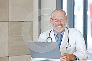 Portrait of a senior caring doctor