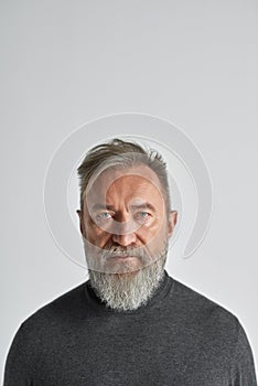 Portrait of senior caucasian man looking at camera