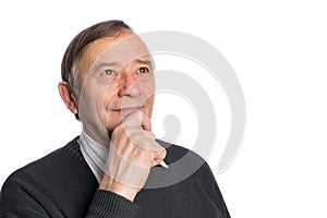 Portrait of senior chairman standing against white background. B