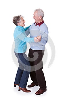 Portrait of senior couple dancing