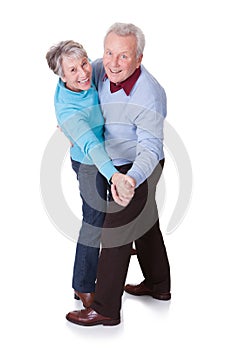 Portrait of senior couple dancing