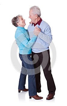 Portrait of senior couple dancing