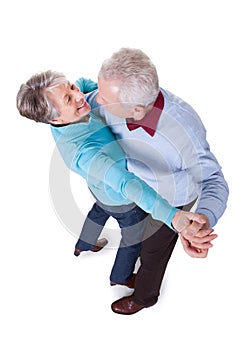 Portrait of senior couple dancing