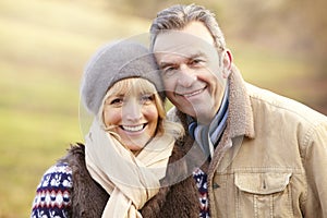 Portrait senior couple outdoors in winter