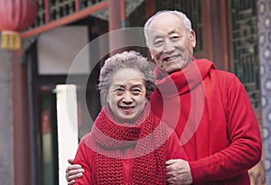 Portrait of Senior Couple outside by a traditional Chinese building